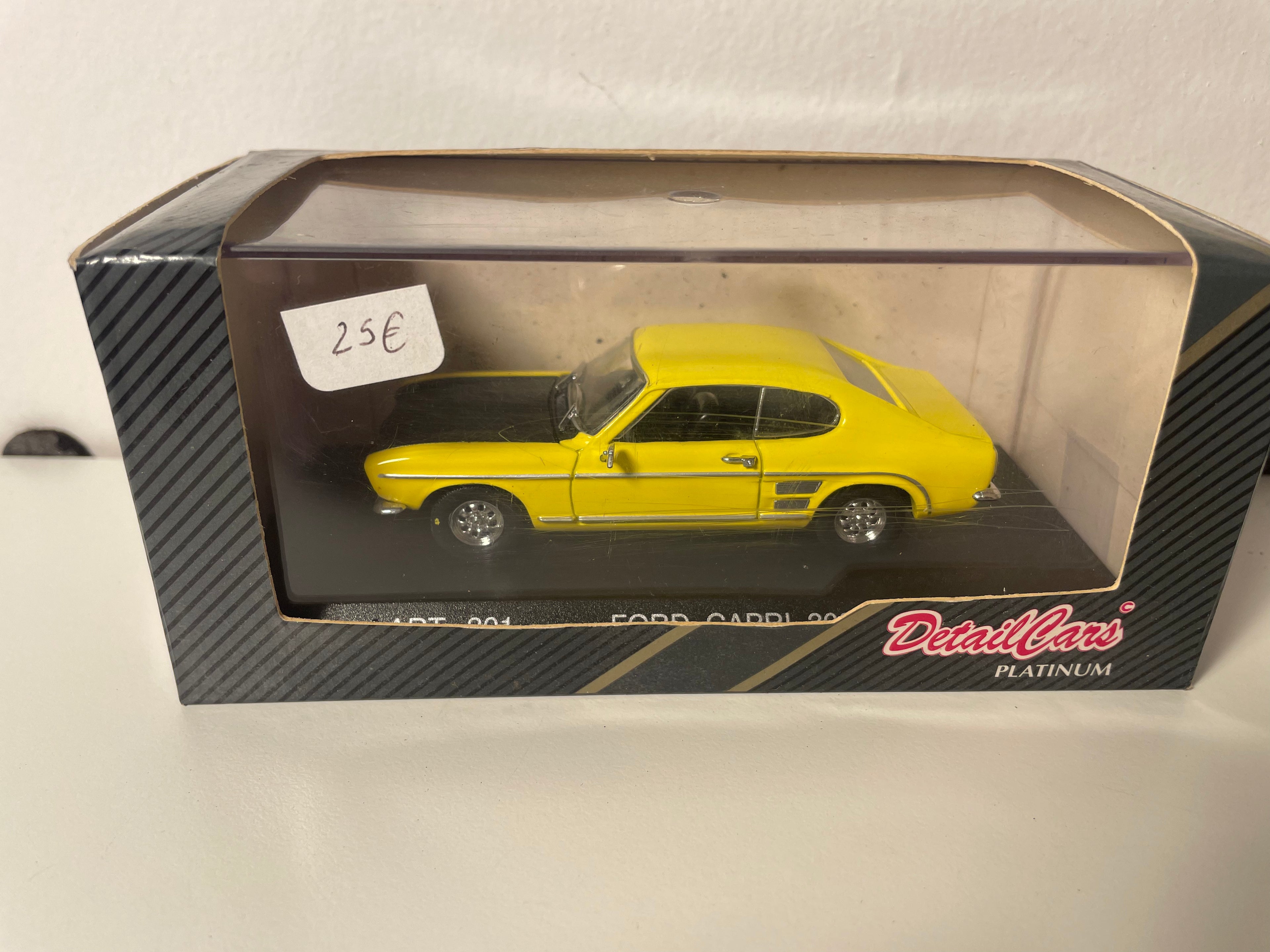 Ford Capri 3000 GT 1969 amarelo e preto (artigo de coleção DetailCars nº 301)