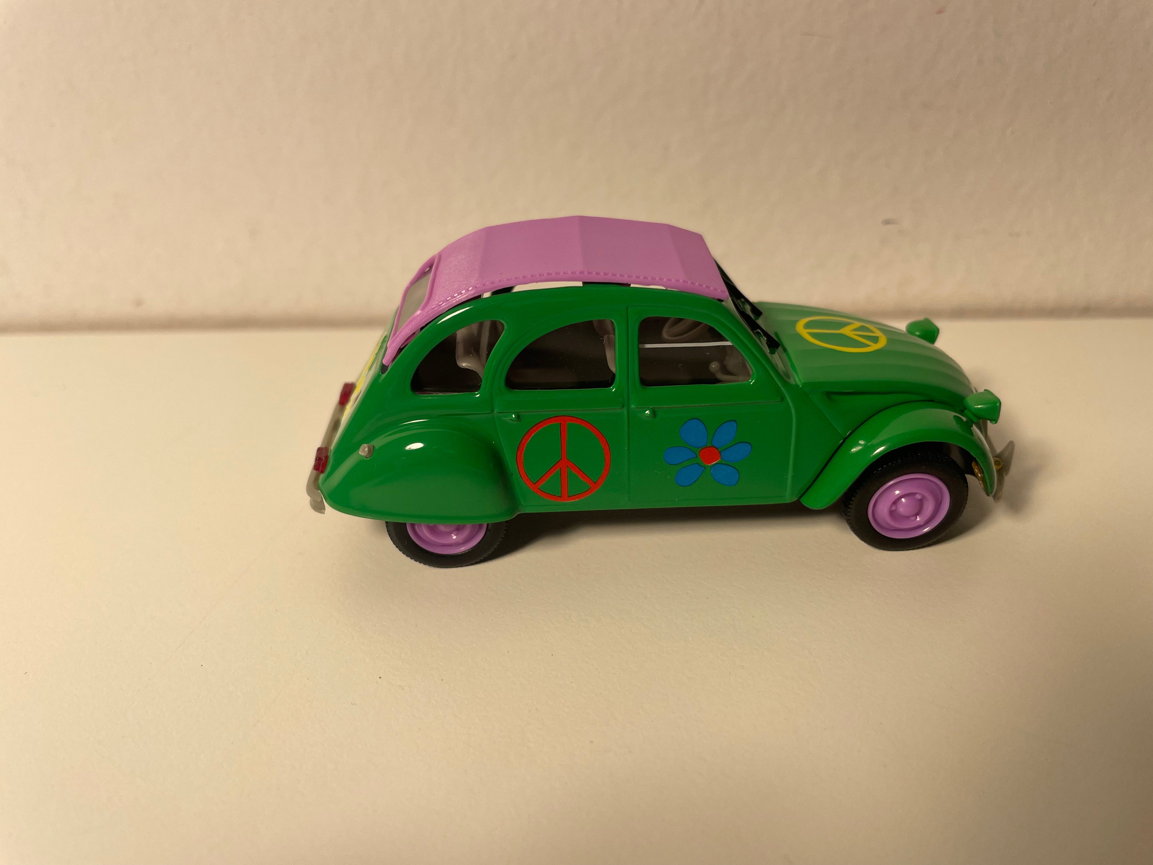 Citroën 2 CV 6 zielona Peace and Love - Norev (w blistrze)