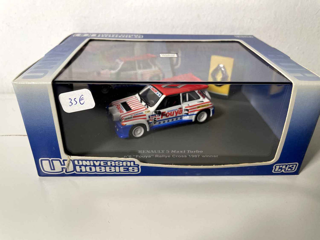 Renault 5 Maxi Turbo blo, wäiss a rout + Sträifen mat der Nummer 6 "Fouya" Rallye-Cross-Gewënnerin vun 1987 (rechteckeg Boxset)