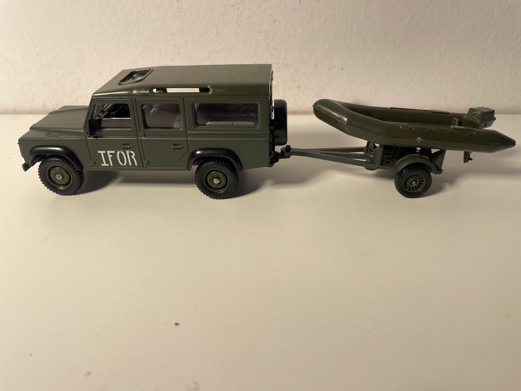 Land Rover Defender militaire avec sa barque - Solido (fabrication française) - boite N°CH1305