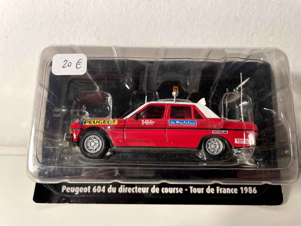 Peugeot 604 rout a wäiss vum Course Directeur vum Tour de France 1986