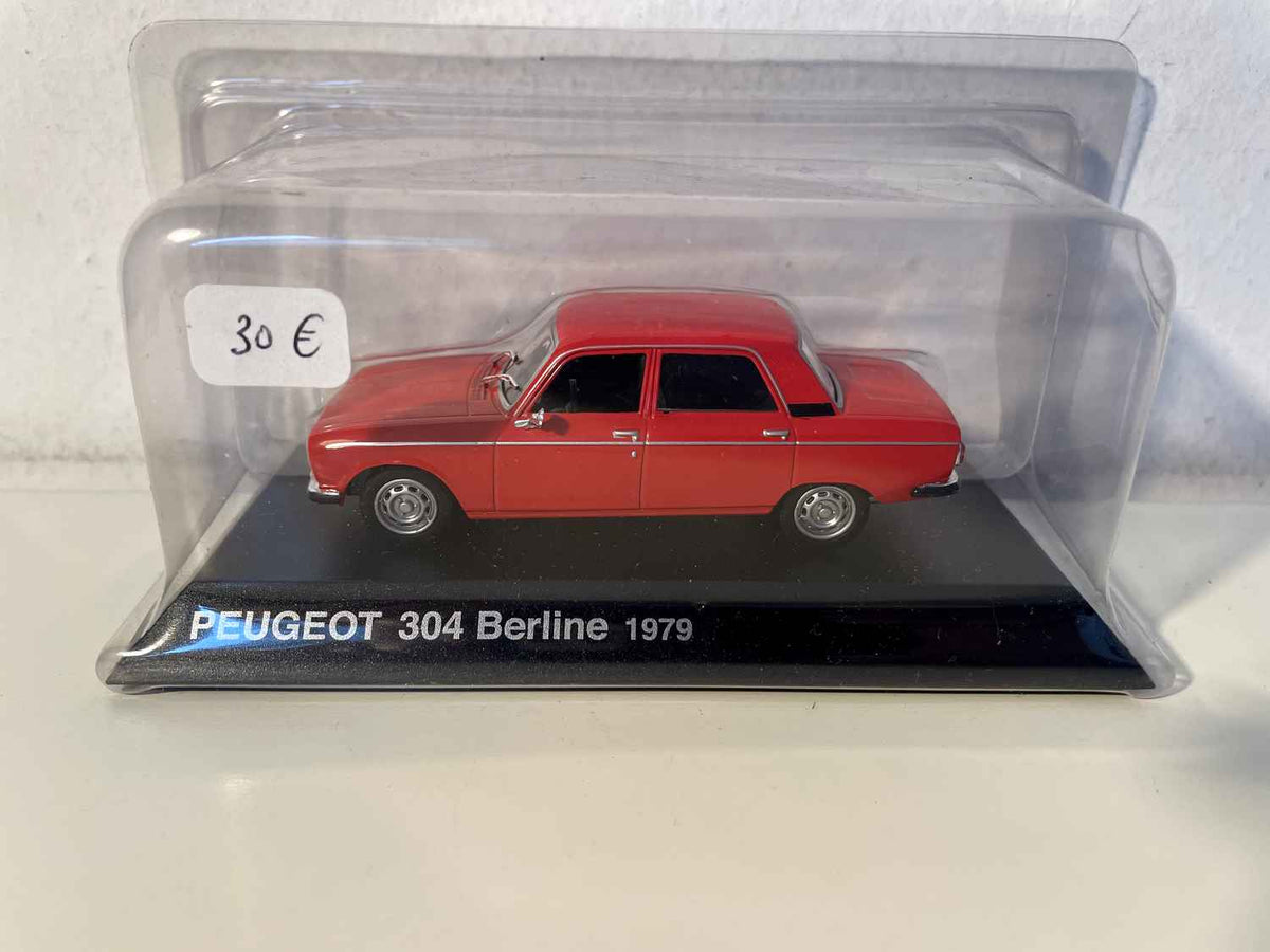 1979 red Peugeot 304 sedan