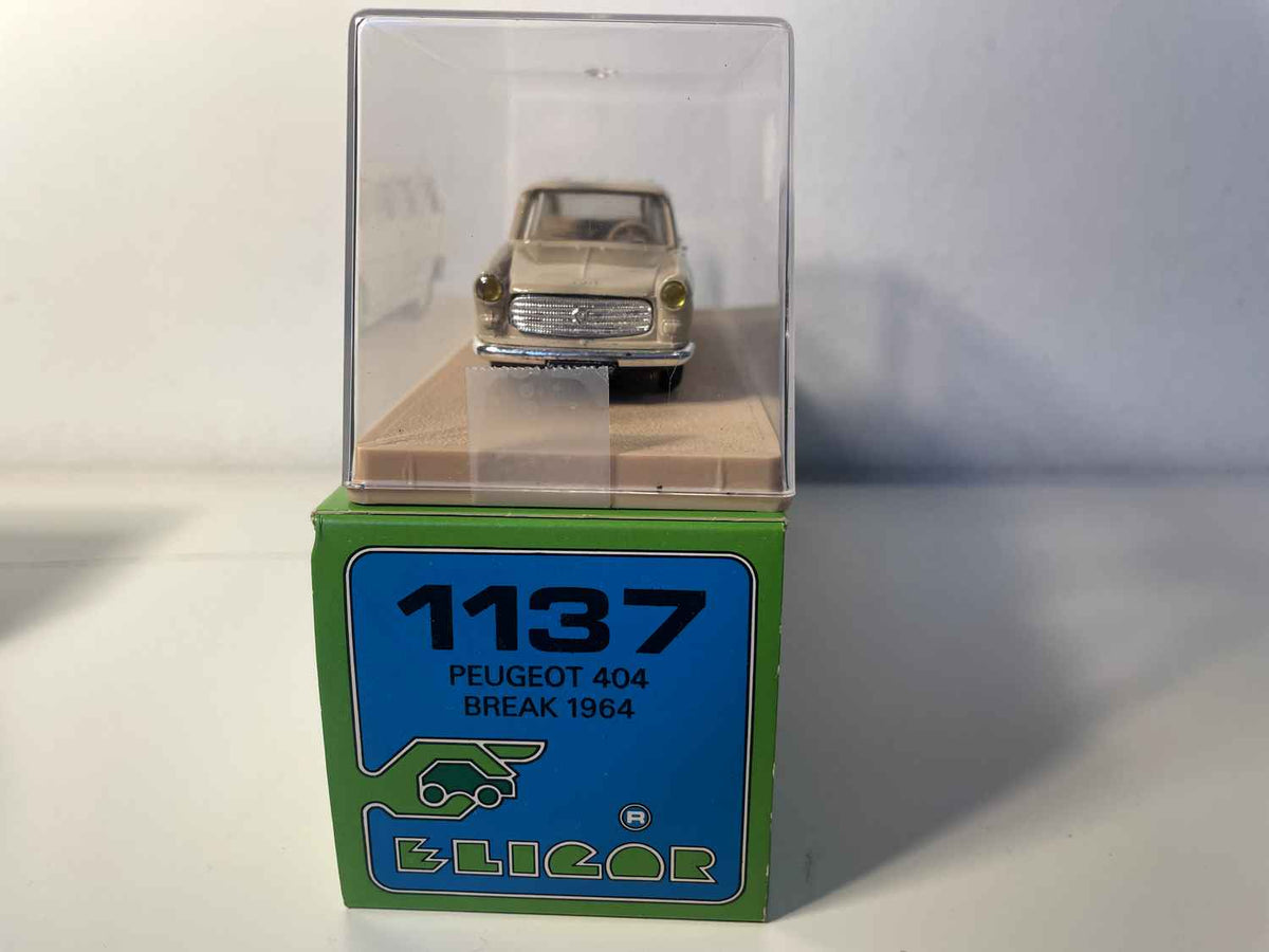 Carrinha Peugeot 404, castanho claro, de 1964 (Eligor)