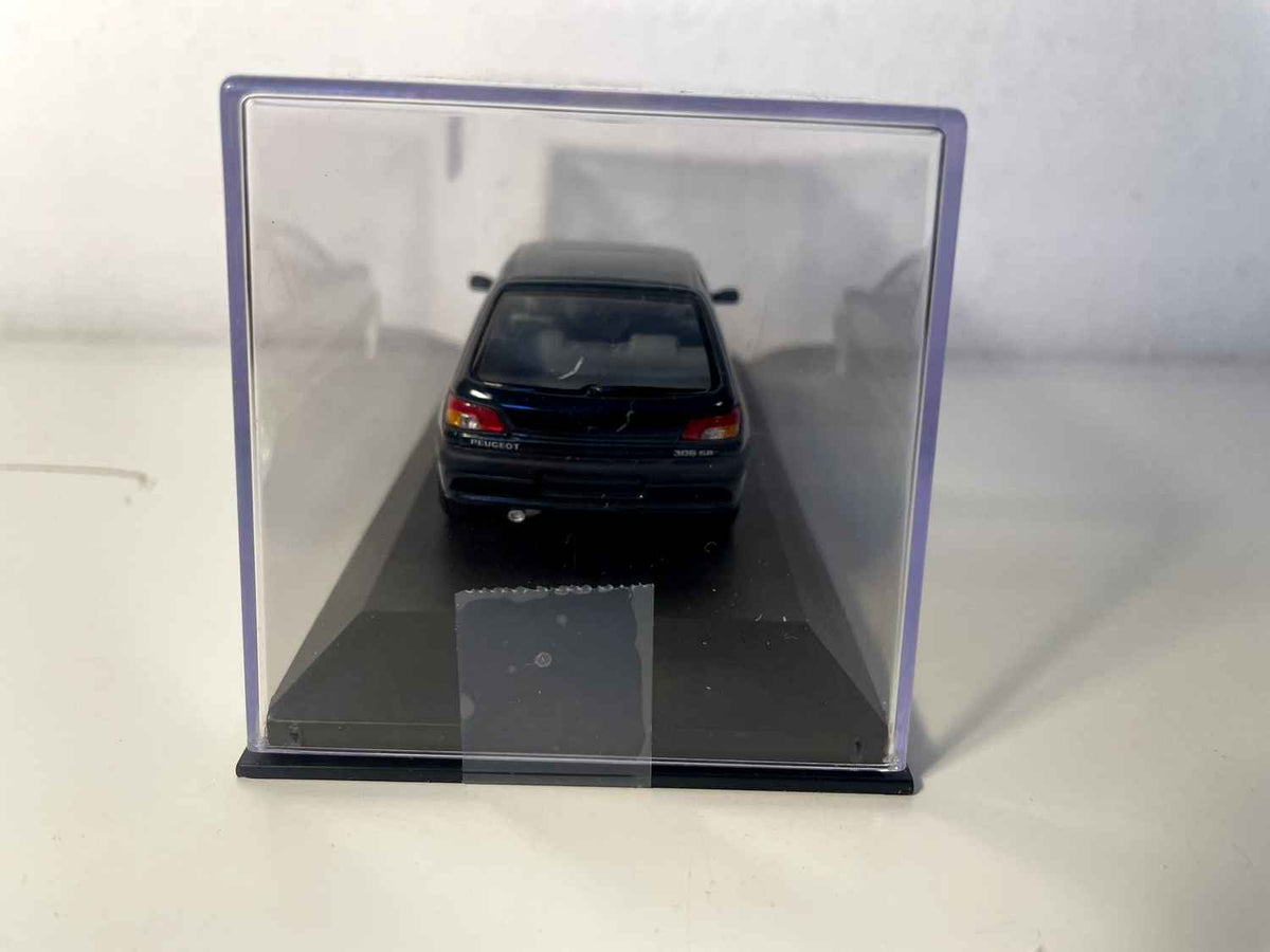 Peugeot 306 verde scuro (Minichamps)