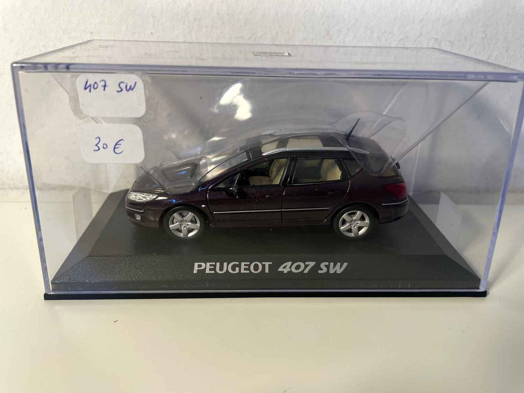 Peugeot 407 SW violette foncée? (Norev)