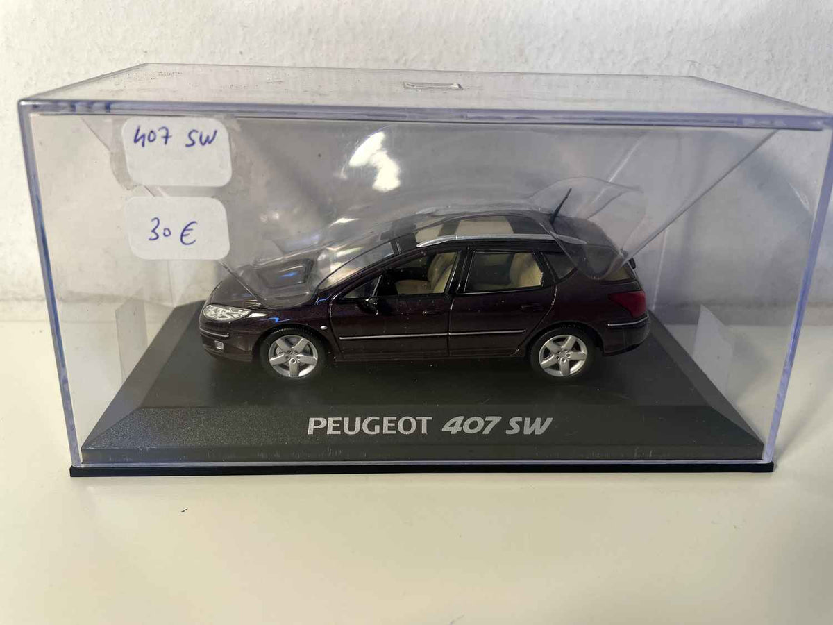 Peugeot 407 SW violette foncée? (Norev)