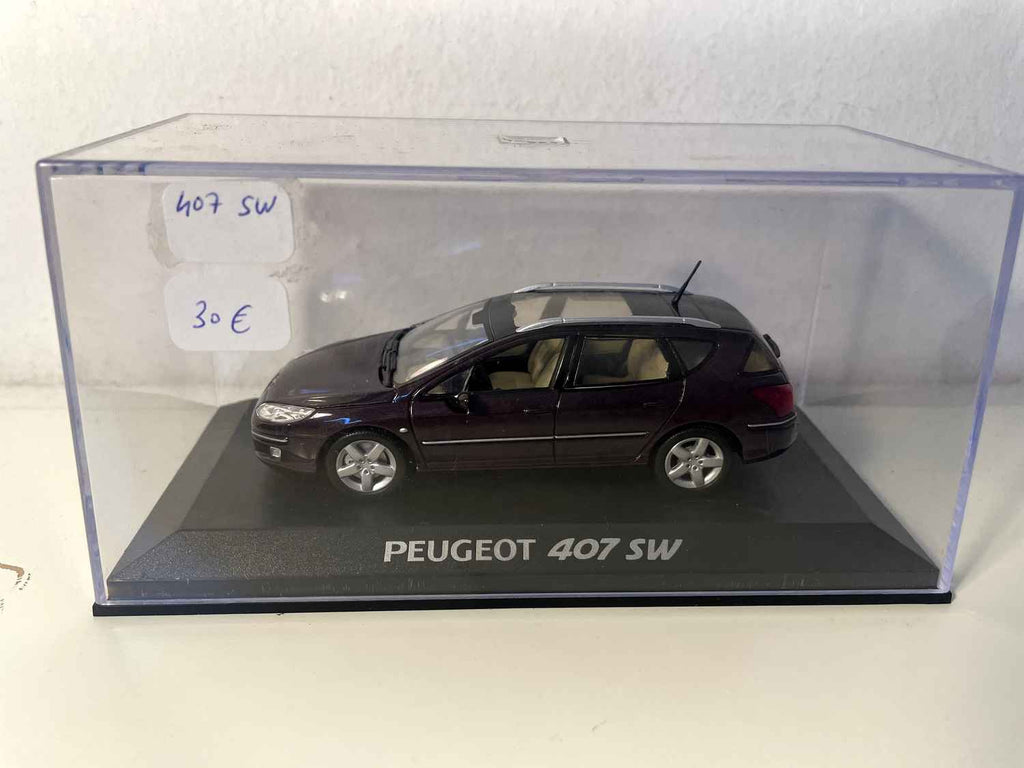 Peugeot 407 SW violette foncée? (Norev)