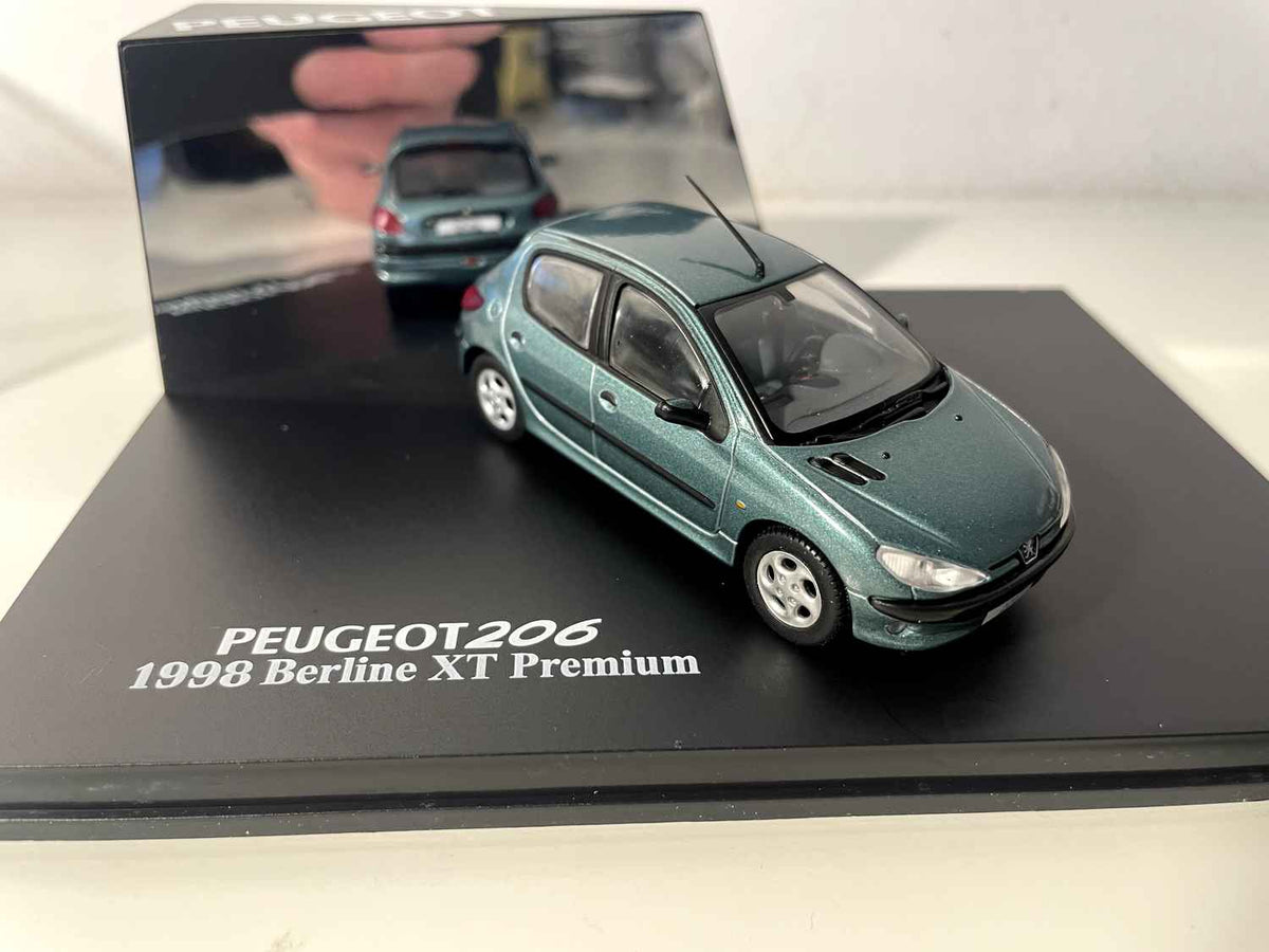 Peugeot 206 berline XT Premium verte de 1998 (coffret boite rectangle) Norev