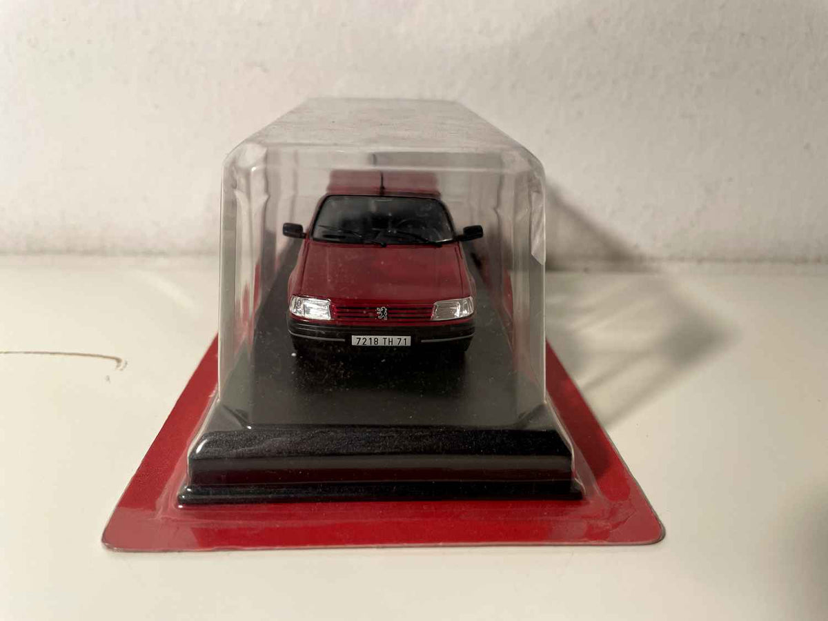 Peugeot 309 donkelrout/bordeauxrout vun 1988 (Blister) AUTO-PLUS