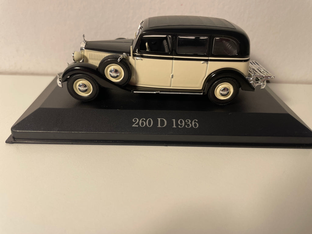Beige en zwarte Mercedes 260 D uit 1936