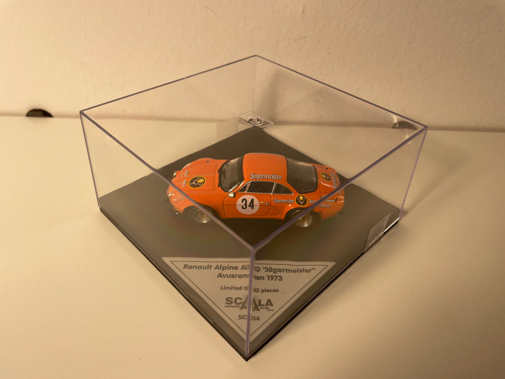 Renault Alpine A110 oranje nummer 34 "Jägermeister" Avusrennen 1973 - TROFEU SCALA 43 modelauto (beperkte editie)