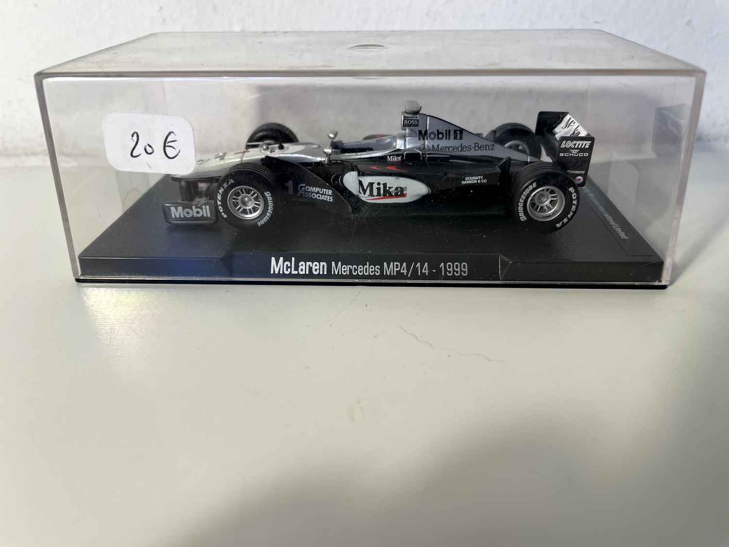 McLaren Mercedes MP4/14 black, grey and white number 1 from 1999 (Formula 1)