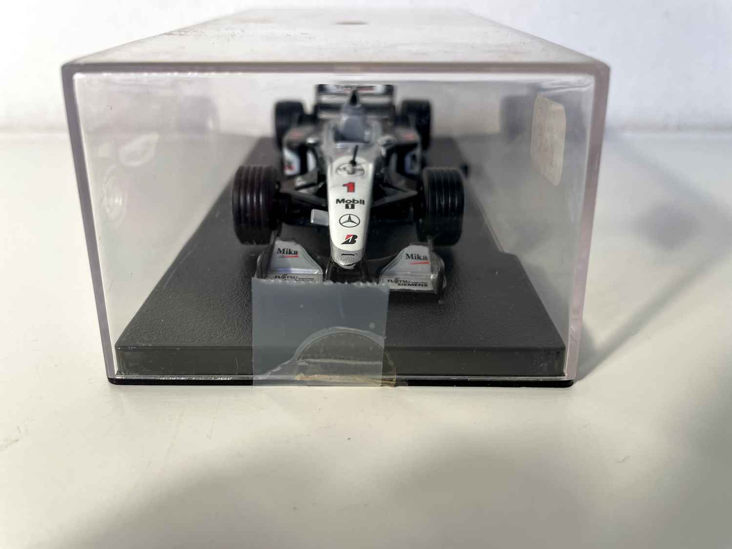 McLaren Mercedes MP4/14 black, grey and white number 1 from 1999 (Formula 1)