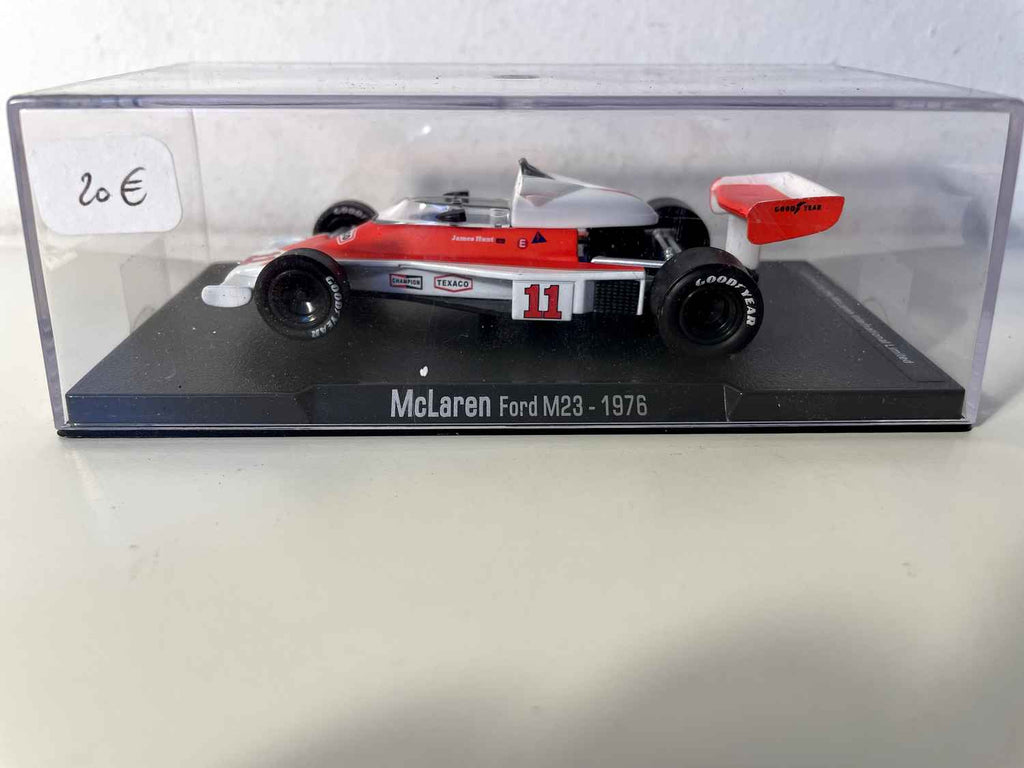 Orange and white McLaren Ford M23 number 11 from 1976 (Formula 1)