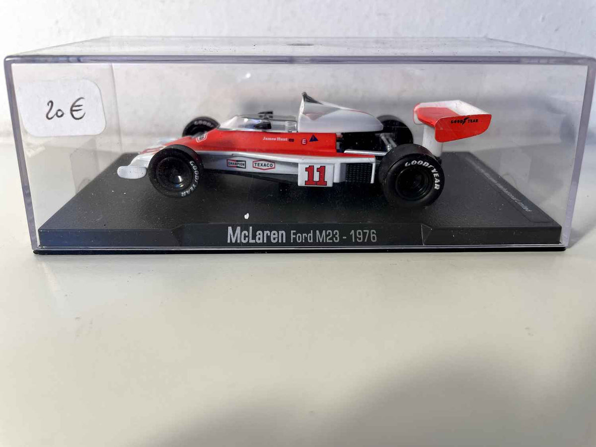 Orange and white McLaren Ford M23 number 11 from 1976 (Formula 1)