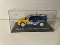 Ford Escort RS Cosworth jaune et bleue numéro 1 MICHELIN