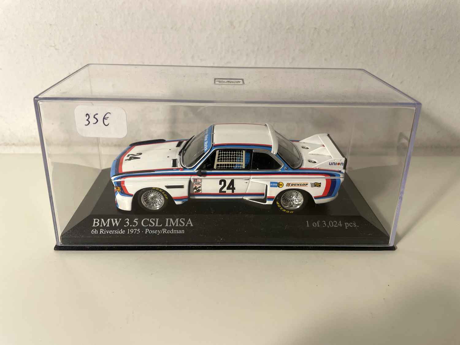 BMW 3.5 CSL IMSA biała, niebieska i czerwona numer 24 - 6 godzin Riverside (Kalifornia) - MINICHAMPS