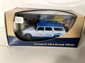 Peugeot 404 blue estate car with VITTEL advertising (for Mr. Marquer)