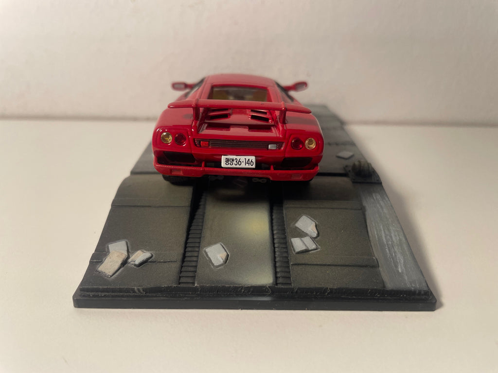 Lamborghini Diablo rouge - JAMES BOND - MEURS UN AUTRE JOUR (Die another day)