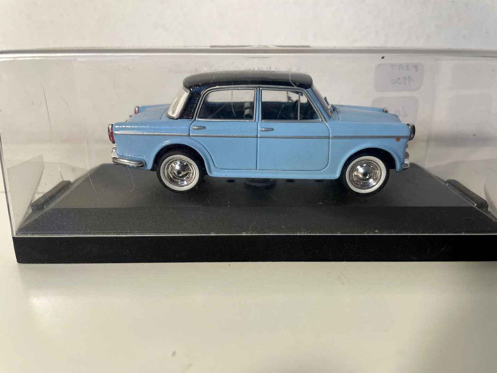 Fiat 110 bloe Himmel a schwaarze Däch