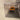Micro-voiture d'antan Bond Bug orange de 1971 - voiture anglaise