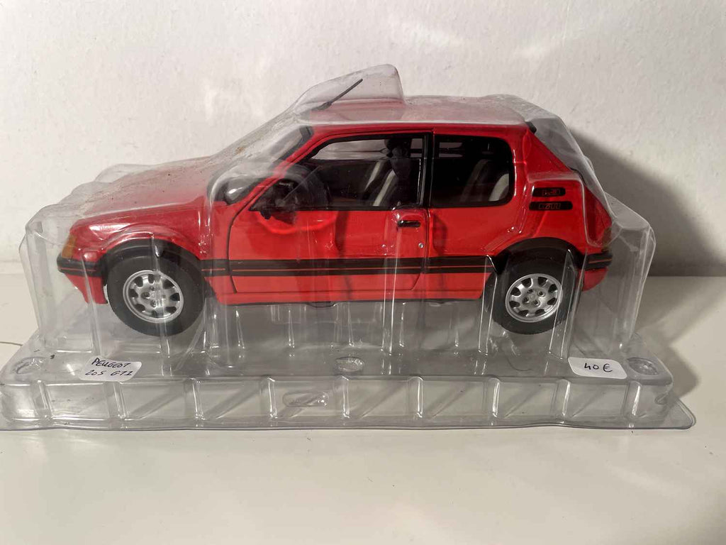 Peugeot 205 GTI czerwony (Solido w skali 1/18)
