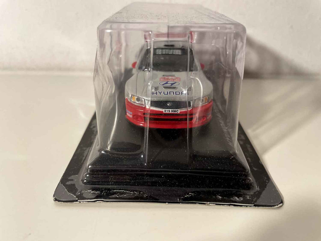 Hyundai Accent WRC grise et rouge numéro 11 - Rallye de Monté-Carlo de 2003 (blister)