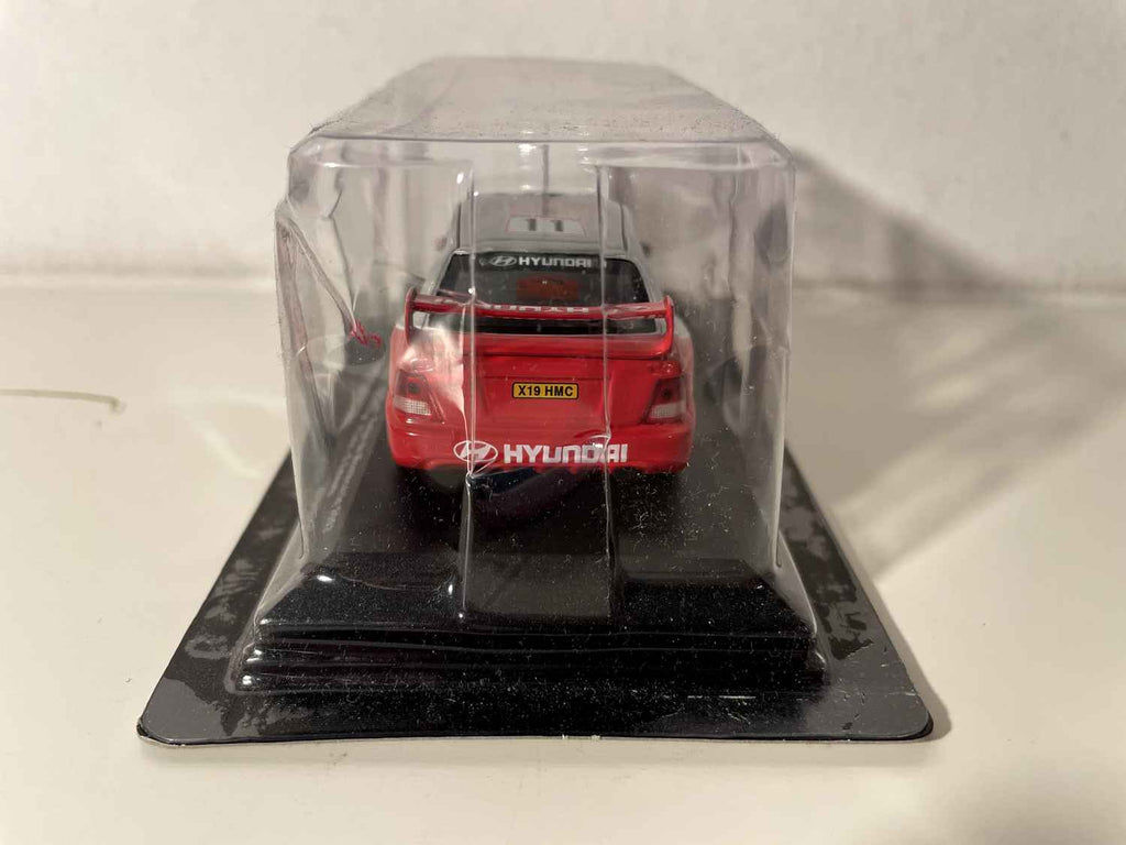 Hyundai Accent WRC grise et rouge numéro 11 - Rallye de Monté-Carlo de 2003 (blister)
