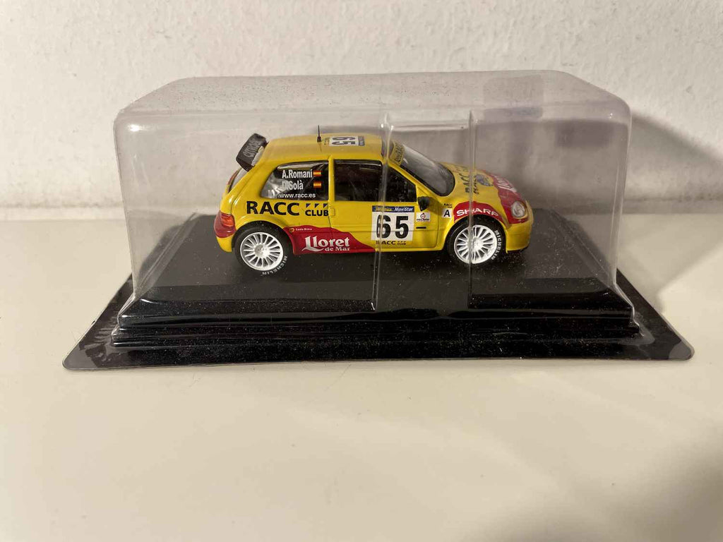 Citroën Saxo S1600 yellow and red number 65 - 2002 Catalunya Rally
