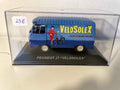 Peugeot J7 blue with VELOSOLEX advertising