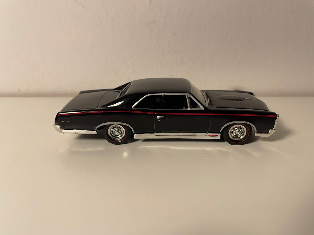 Pontiac GTO TM GM schwaarz vun 1967 - MATCHBOX (amerikaneschen Auto)