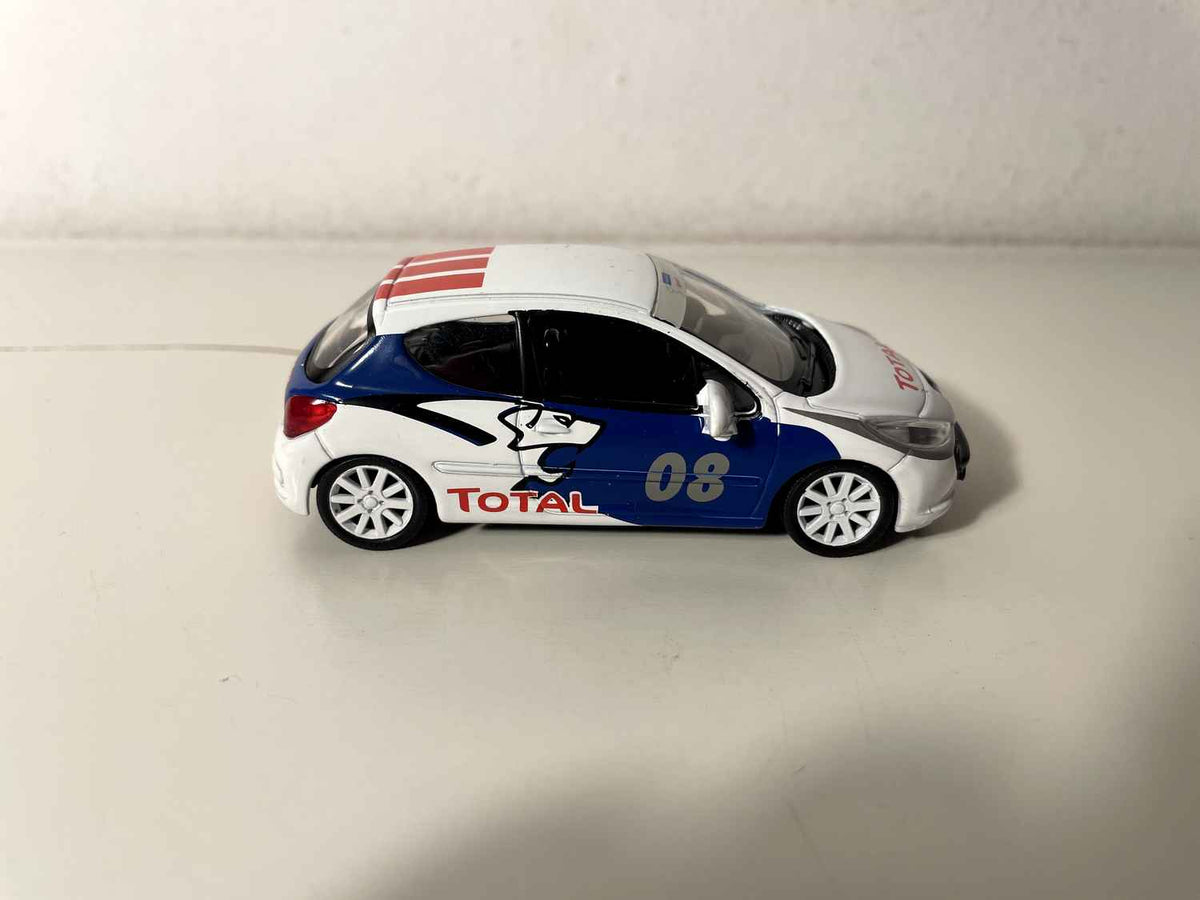 Peugeot 207 wäiss, blou an rout Nummer 08 - Norev