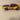 Pontiac GTO giel, blaut an rout - BUDWEISER Bieren - MATCHBOX (am amerikanesche Auto)
