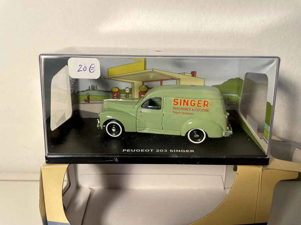Peugeot 203 verte avec la publicité SINGER Bernard Miniatures