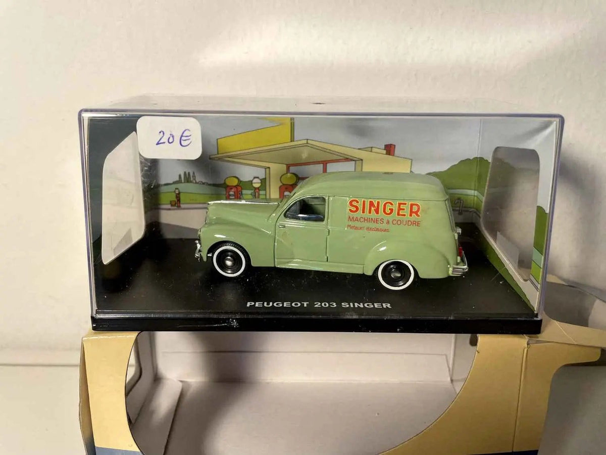 Peugeot 203 verte avec la publicité SINGER Bernard Miniatures