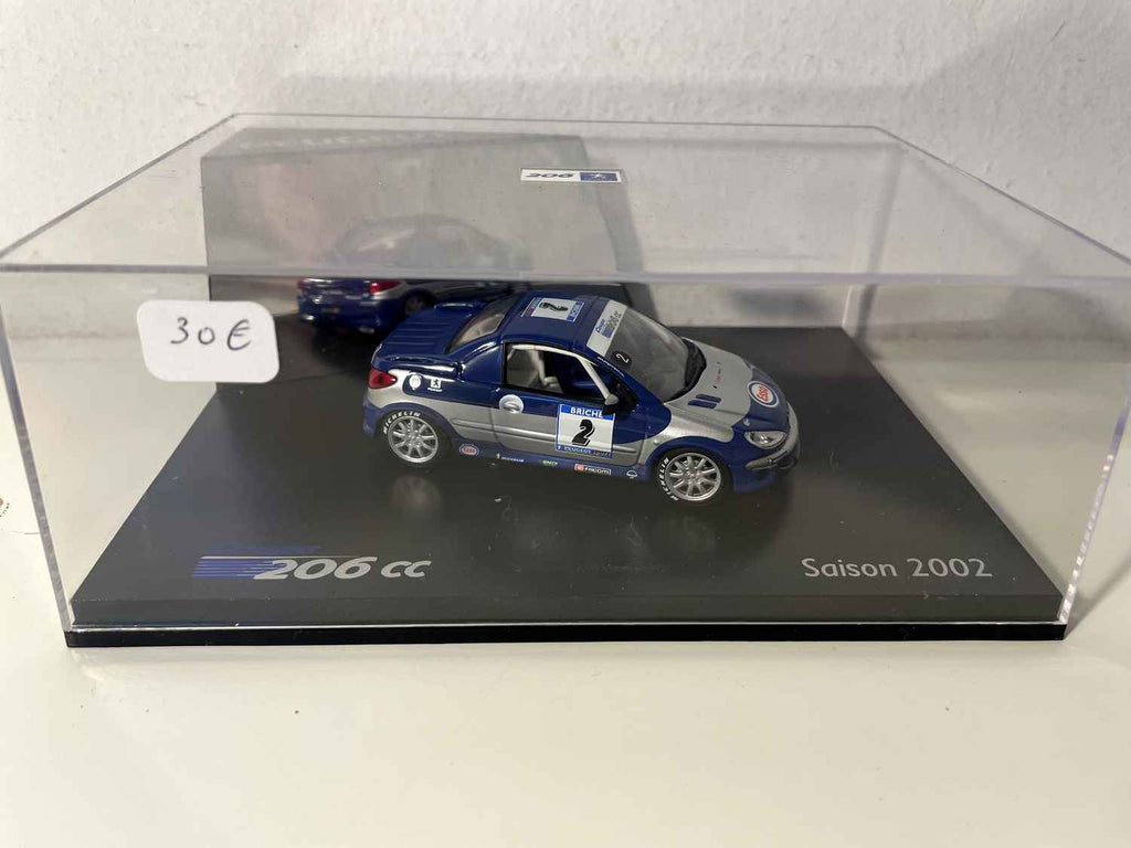 Peugeot 206cc de course bleue et grise avec le numéro 2 saison 2002 (coffret boite rectangle) Norev Bernard Miniatures