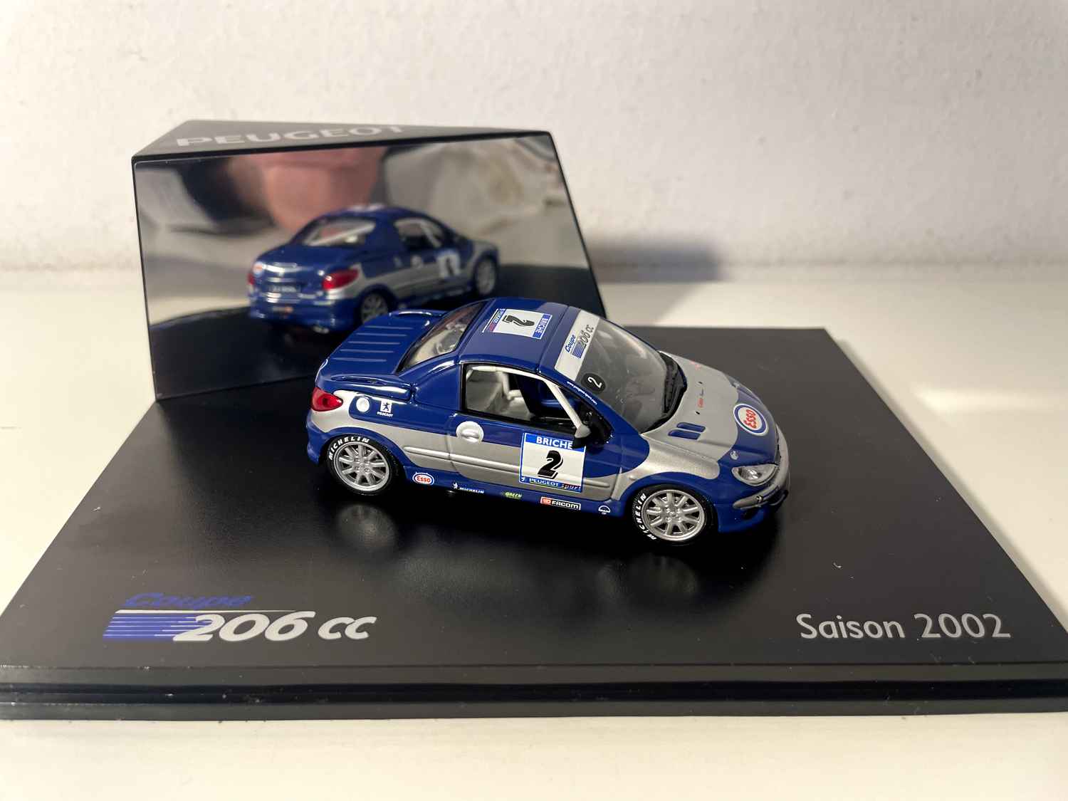 Peugeot 206cc de course bleue et grise avec le numéro 2 saison 2002 (coffret boite rectangle) Norev Bernard Miniatures