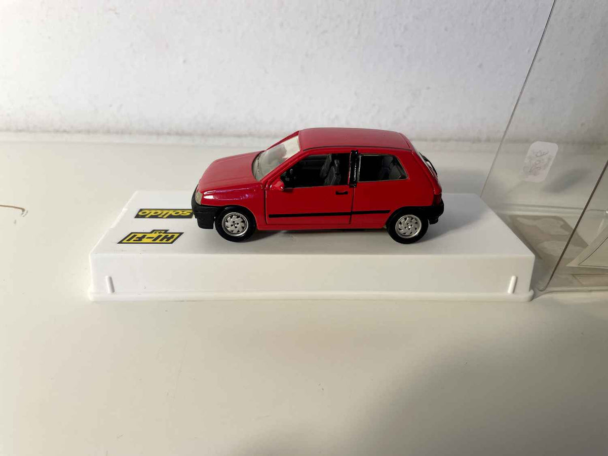 Renault Clio rouge (Solido référence 1519 socle blanc) Bernard Miniatures