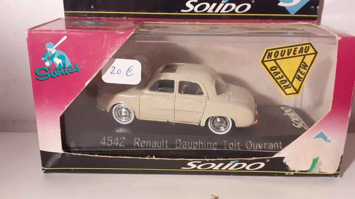 Renault Dauphine avec toit ouvrant de couleur beige foncé/marron clair? (avec boite en carton) Solido référence 4542 Bernard Miniatures
