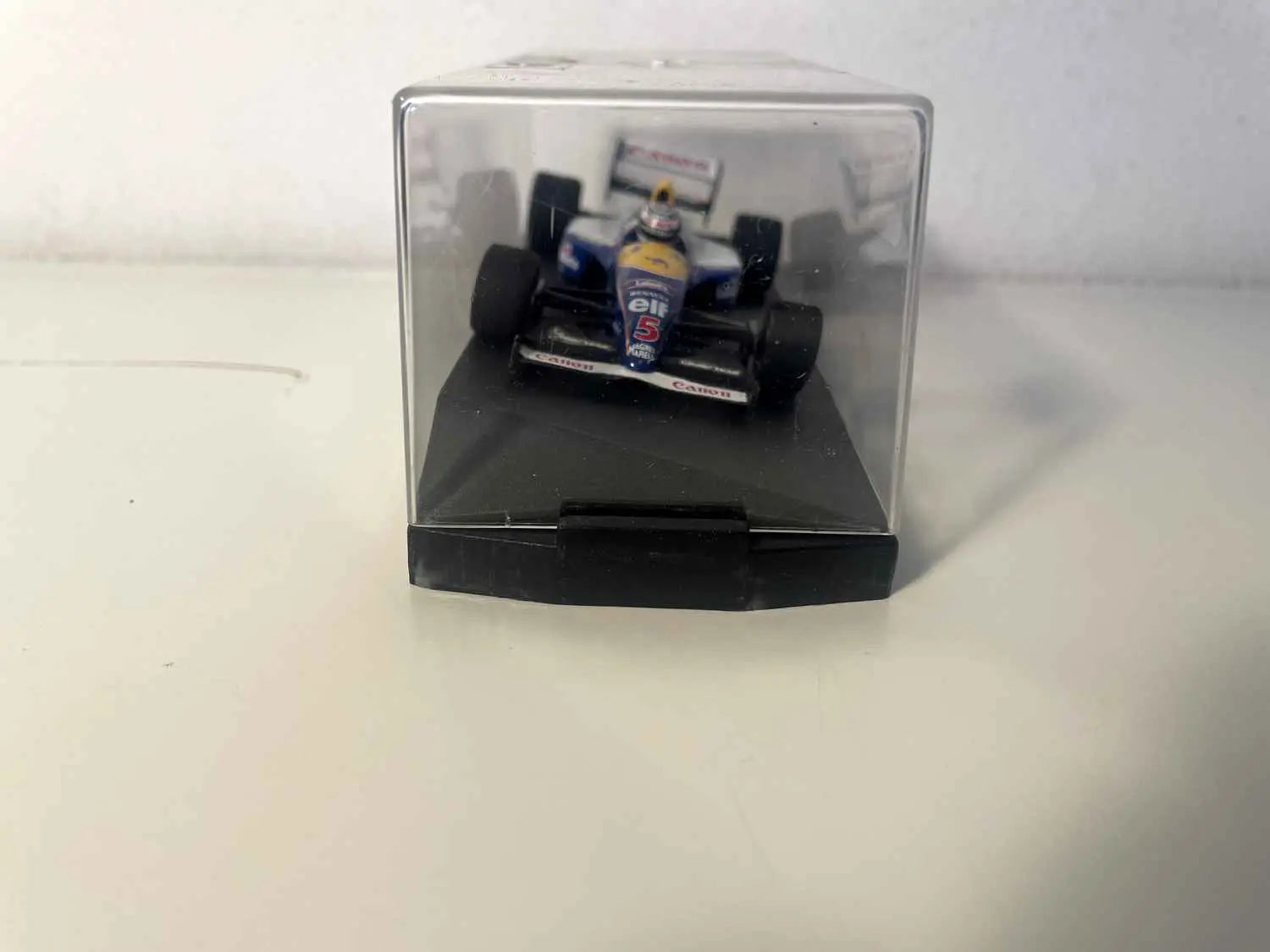 Voiture Formule 1 bleue, blanche et jaune numéro 5 (boite rectangle) collection ONYX Bernard Miniatures