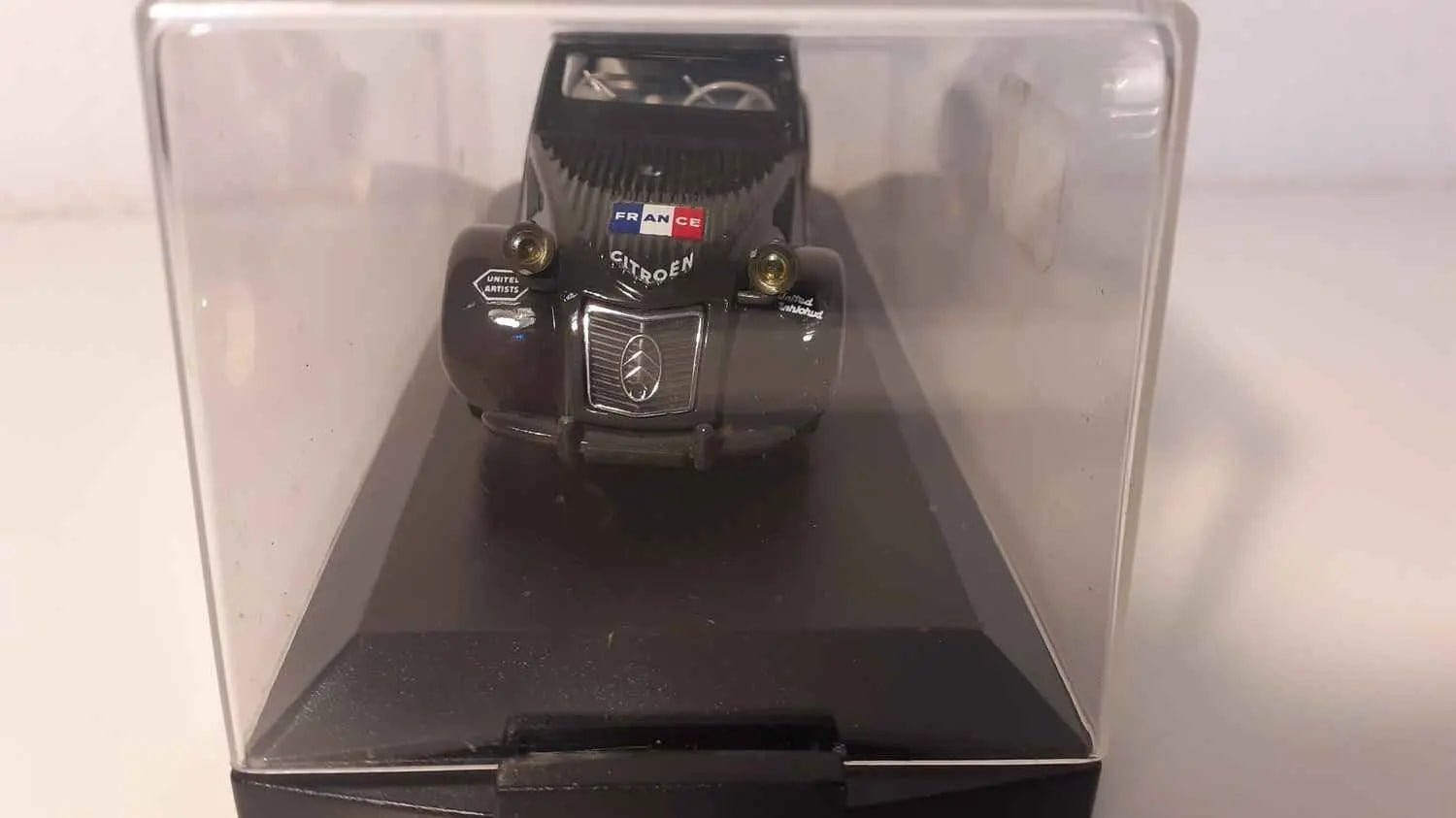 Voitures Miniatures Citroën 2 CV LES TROIS AMERIQUES grise foncée de 1953 (marque Vitesse) - Bernard Miniatures
