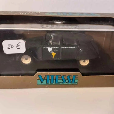 Voitures Miniatures Citroën 2 CV LES TROIS AMERIQUES grise foncée de 1953 (marque Vitesse) - Bernard Miniatures