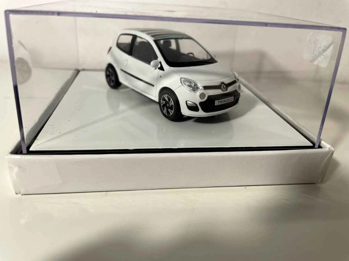 Voitures Miniatures Renault Twingo blanche avec rayures toutes couleurs sur le toit (boite carrée) - Bernard Miniatures