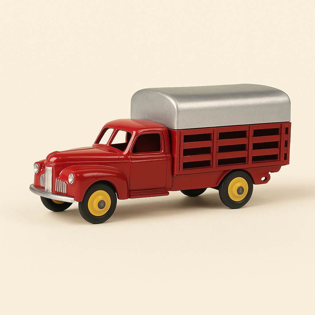 Camion Studebaker Tapissière rouge et bâche jaune Dinky-Toys (éditions Atlas) - N°25 L