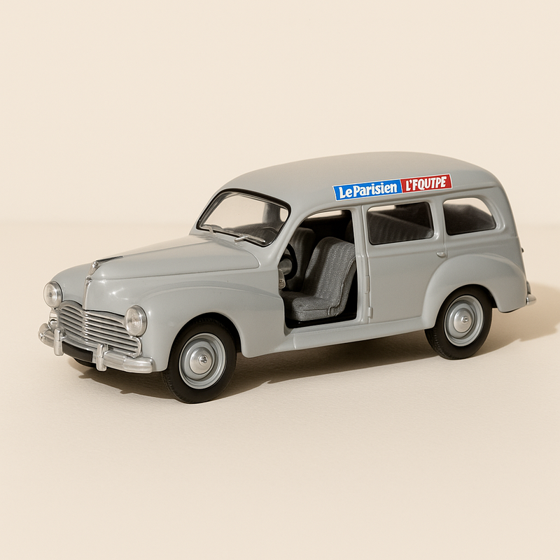 Grey Peugeot 203 commercial car of the race stewards of the 1956 Tour de France