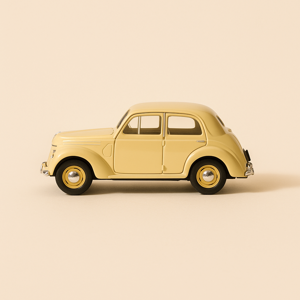 Renault Juvaquatre berline beige de 1939 (ELIGOR) boite violette
