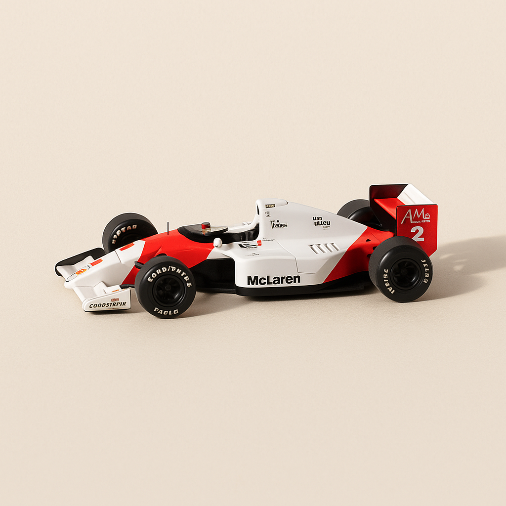 McLaren MP 4/2B white and orange number 2 from 1985 - Formula 1