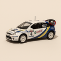 Ford Focus WRC blanche, bleue et noire numéro 4 - Rallye de l'Acropole de 2003 - Image haute qualité