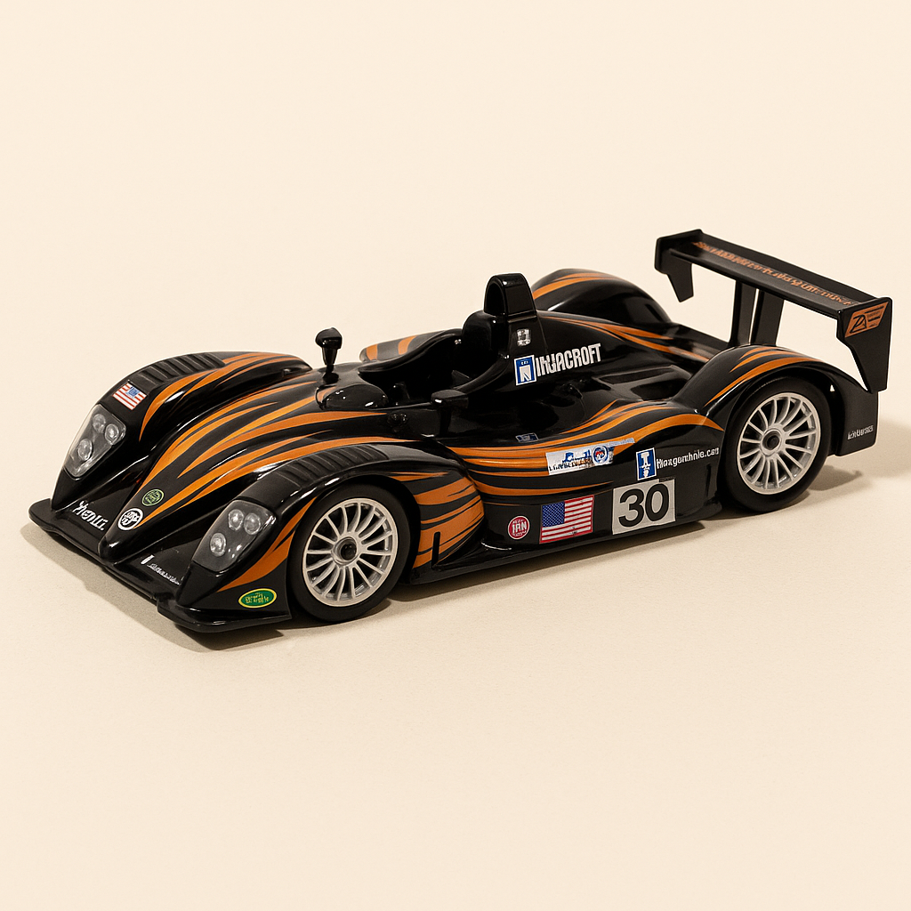 MG Lola EX257 schwaarz an orange Nummer 30 - 24 Stonne vum Le Mans 2002