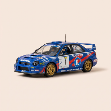 Voiture miniature - Subaru Impréza WRC bleue numéro 1 - Rallye Lyon-Charbonnières 2002